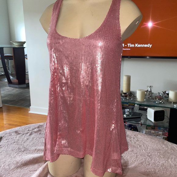 Shiny babydoll shirt. Stunning with a pair of heels and jeans. - Picture 4 of 15